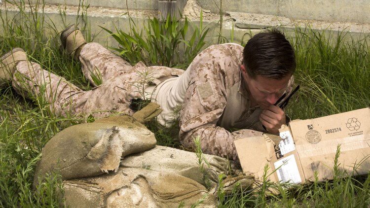 Staff Sgt. Keith Losordo, an explosive ordnance technician with 2nd Explosive Ordnance Company, 8th Engineer Support Battalion assesses the effect a Percussion Actuated Neutralizer had on a hazardous package during a demolition exercise aboard Marine Corps Base Camp Lejeune, North Carolina, May 14, 2015. The exercise is part of the unit’s preparations for an upcoming deployment with Special Purpose Marine Air-Ground Task Force Crisis Response-Africa and gave Marines hands-on training with tools that allow them to neutralize hazards while causing minimal damage in urban settings.