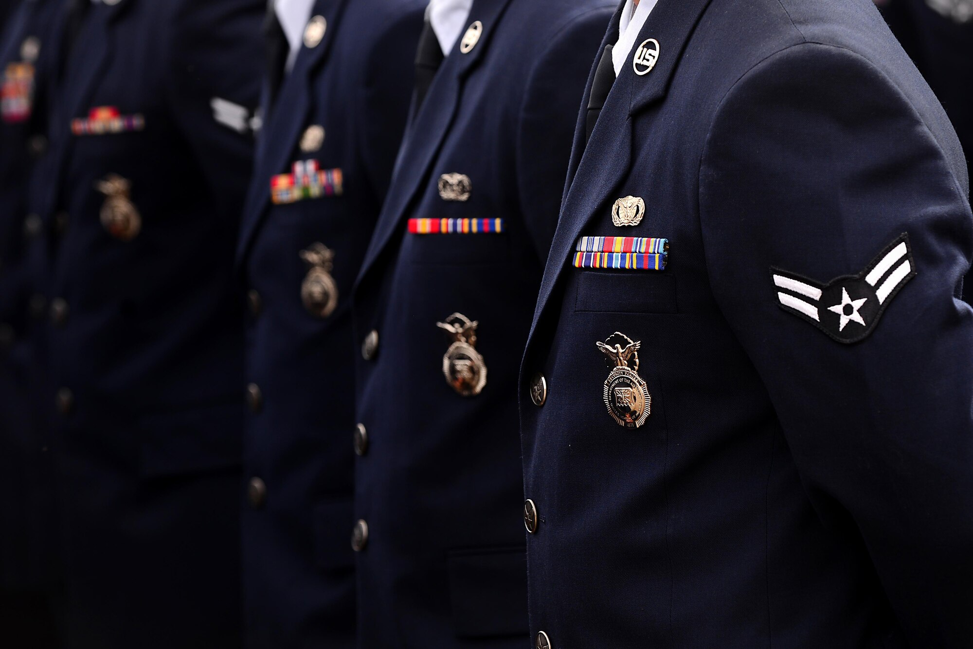 Air Commandos from the 27th Special Operations Security Forces Squadron assemble to pay their respects at a memorial retreat ceremony May 14, 2015 at Cannon Air Force Base, N.M. The ceremony honored 146 peacekeepers who fell in the line of duty in 2014 in addition to those who continue to serve today. (U.S. Air Force Photo/Airman 1st Class Shelby Kay-Fantozzi) 