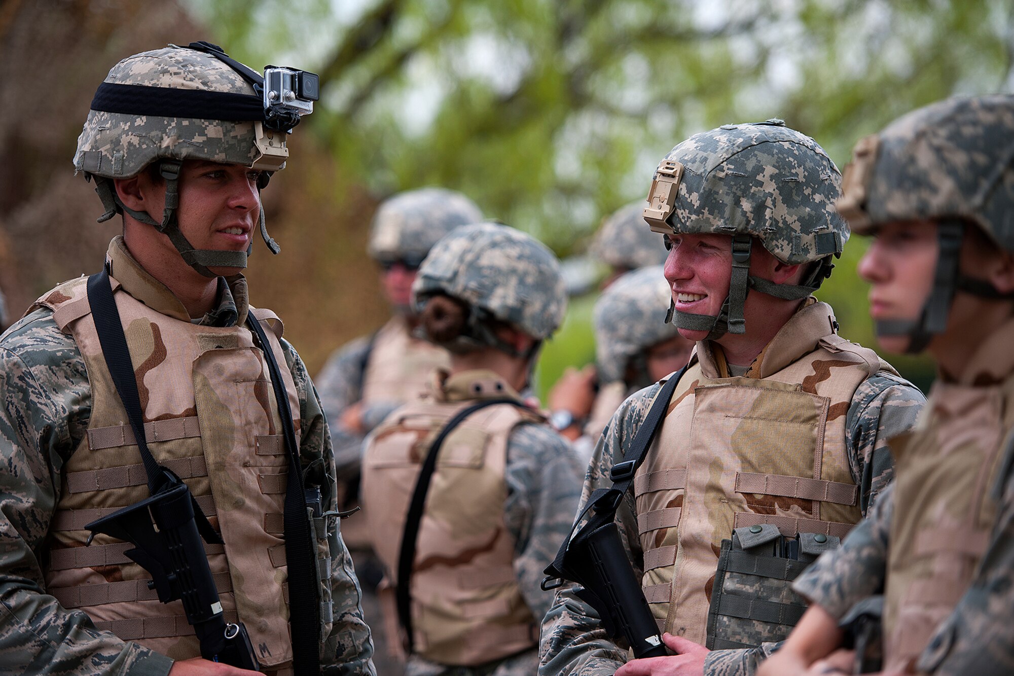 GOODFELLOW AIR FORCE BASE, Texas – Todd M. Duquette and Wyatt J. Bersch, Angelo State University Air Force ROTC Detachment 847 cadets, converse prior to a field training exercise at Camp Sentinel April 17. The FTX is designed to give cadets a broader understanding of what the Air Force is truly like before committing to serve. (U.S. Air Force photo/ Airman 1st Class Devin Boyer)
