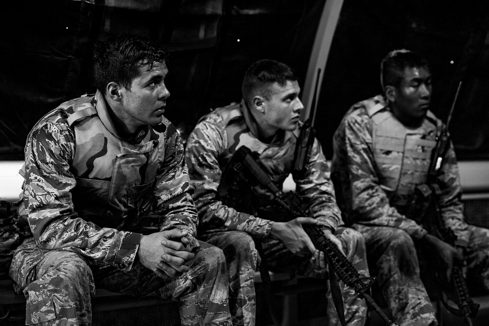 GOODFELLOW AIR FORCE BASE, Texas – Todd M. Duquette, Matthew K. Eddins and Ray T. Chhith, Angelo State University Air Force ROTC Detachment 847 cadets, listen to feedback after running a scenario during a field training exercise at Camp Sentinel April 18. The cadre running the FTX told the cadets how effective they were and what they could do to improve. (U.S. Air Force photo/ Airman 1st Class Devin Boyer)