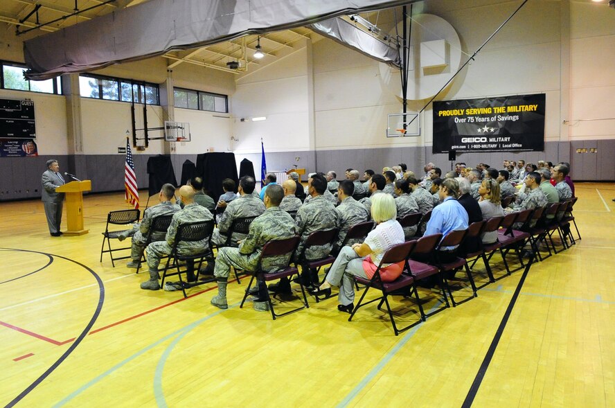 Retired Maj. Gen. Richard Secord speaks to audience members during the Brig. Gen. Harry C. “Heine” Aderholt Display unveiling ceremony at the Aderholt Fitness Facility on Hurlburt Field, Fla., May 11, 2015. Aderholt served as the vice commander and then commander of the 1st Air Commando Wing at Hurlburt Field, a predecessor of the 1st Special Operations Wing, from March 1964 until August 1965. Hurlburt Field named the main fitness facility after General Aderholt in 2004. (U.S. Air Force photo/Airman 1st Class Andrea Posey)