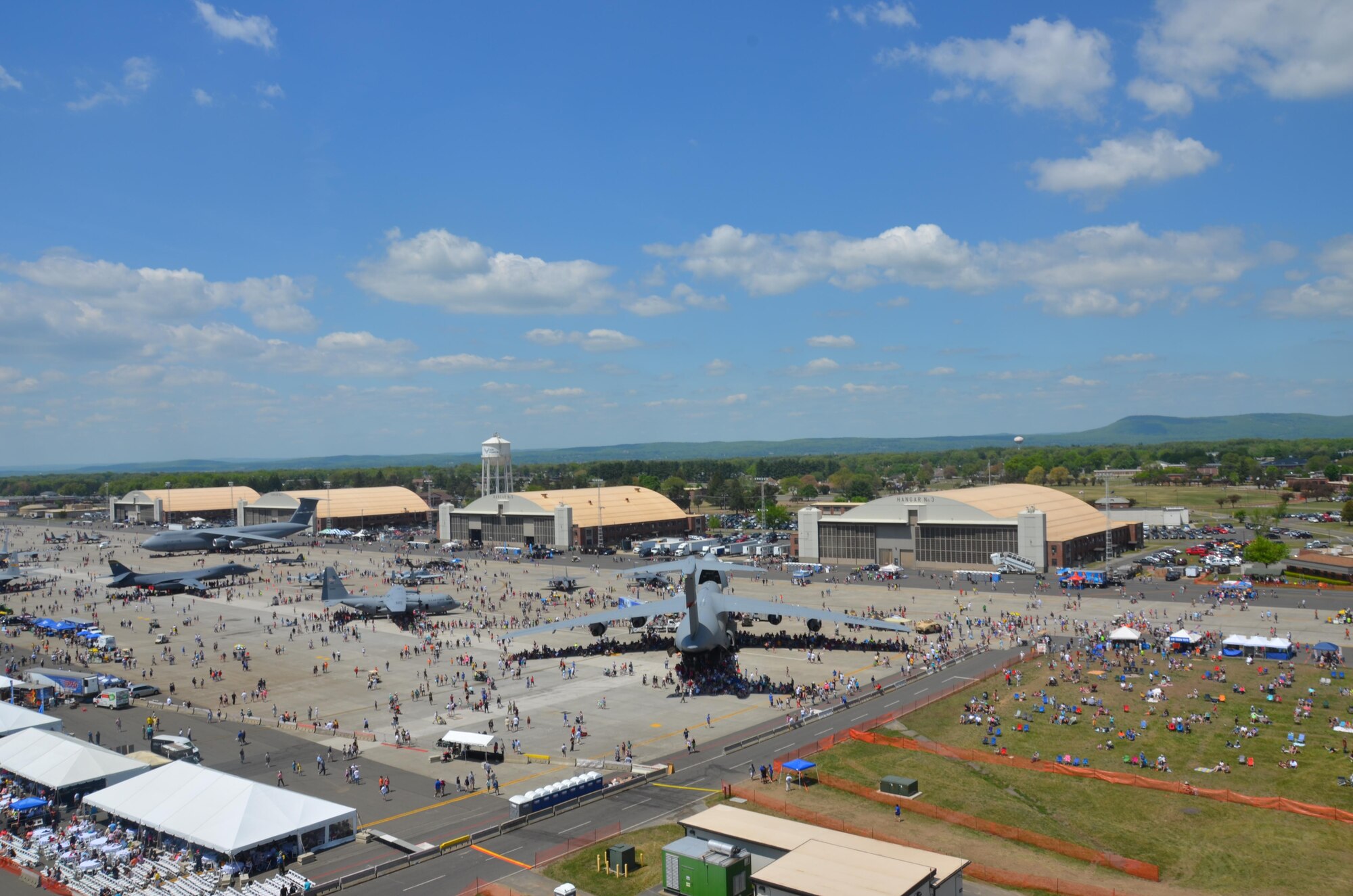 Nearly 400,000 spectators came to Westover Air Reserve Base to watch the 2015 Great New England Air Show, boasting more than two dozen current and vintage military aircraft. Aerial demonstration teams included the U.S. Navy Blue Angels, Canadian Snowbirds, U.S. Army’s Golden Knights parachuting team, F-22 demo team, Geico Skytypers, and Canadian CF-18 team. (U.S. Air Force photo/SSgt. Kelly Goonan)