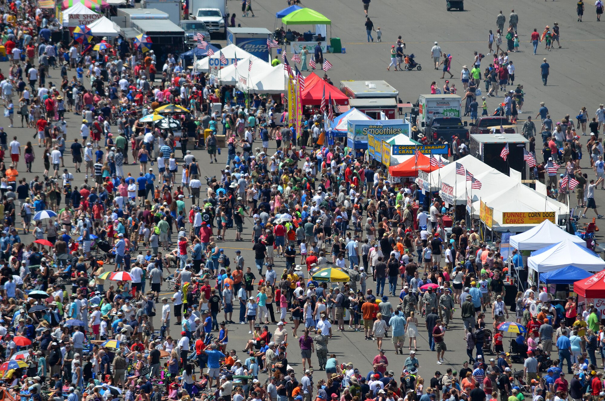 Nearly 400,000 spectators came to Westover Air Reserve Base to watch the 2015 Great New England Air Show, boasting more than two dozen current and vintage military aircraft. Aerial demonstration teams included the U.S. Navy Blue Angels, Canadian Snowbirds, U.S. Army’s Golden Knights parachuting team, F-22 demo team, Geico Skytypers, and Canadian CF-18 team. (U.S. Air Force photo/SSgt. Kelly Goonan)