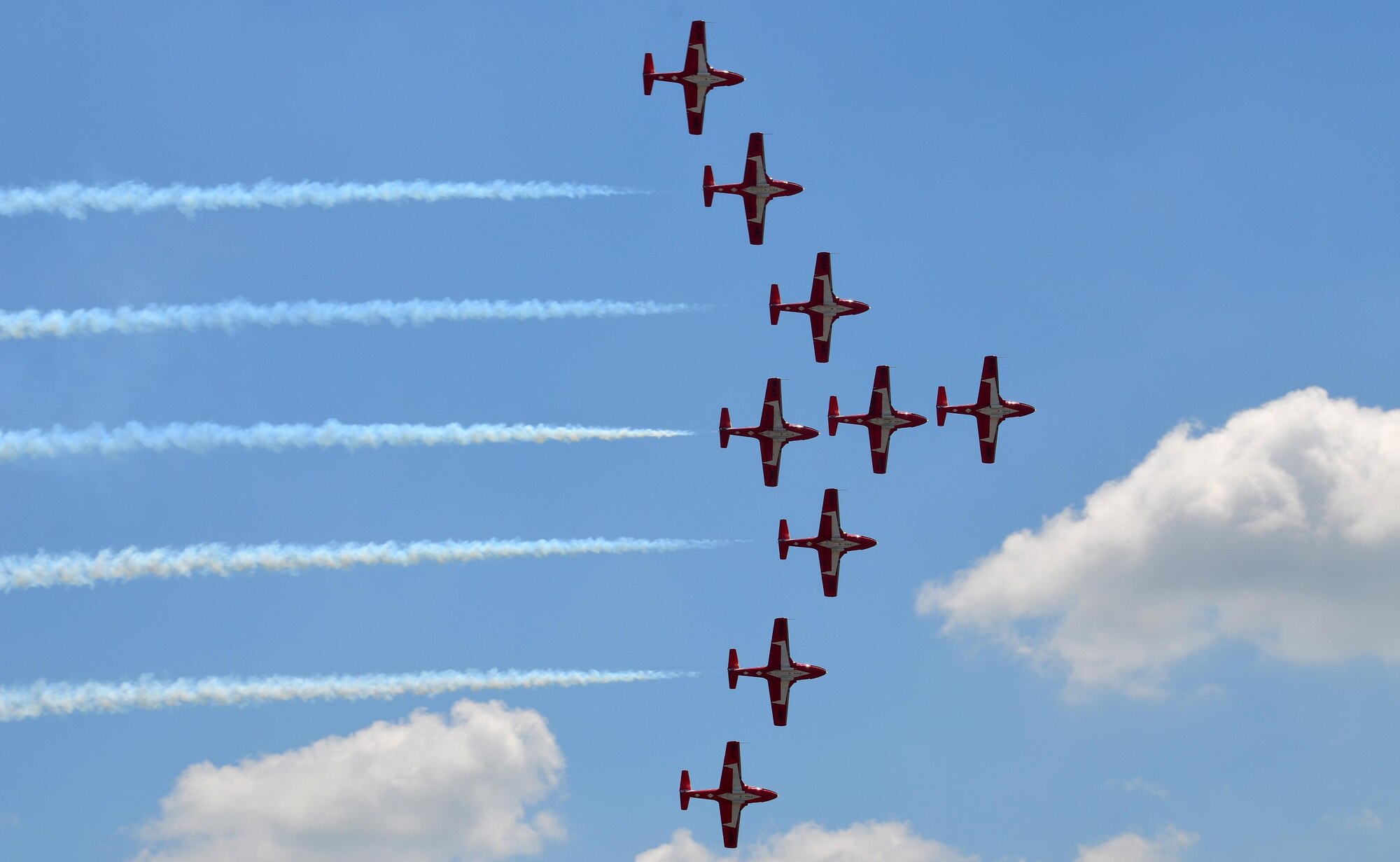 Nearly 400,000 spectators came to Westover Air Reserve Base to watch the 2015 Great New England Air Show, boasting more than two dozen current and vintage military aircraft. Aerial demonstration teams included the U.S. Navy Blue Angels, Canadian Snowbirds, U.S. Army’s Golden Knights parachuting team, F-22 demo team, Geico Skytypers, and Canadian CF-18 team. (U.S. Air Force photo/SSgt. Kelly Goonan)