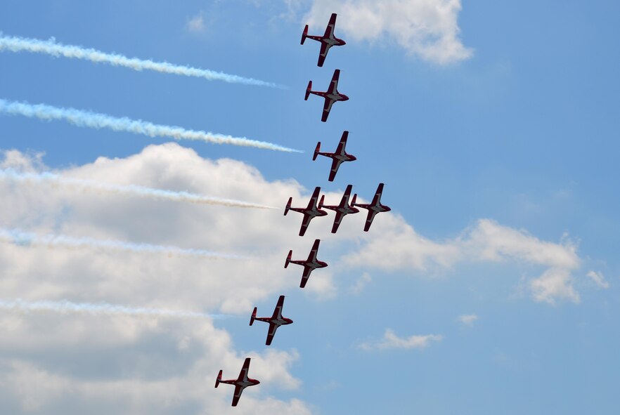 Nearly 400,000 spectators came to Westover Air Reserve Base to watch the 2015 Great New England Air Show, boasting more than two dozen current and vintage military aircraft. Aerial demonstration teams included the U.S. Navy Blue Angels, Canadian Snowbirds, U.S. Army’s Golden Knights parachuting team, F-22 demo team, Geico Skytypers, and Canadian CF-18 team. (U.S. Air Force photo/SSgt. Kelly Goonan)