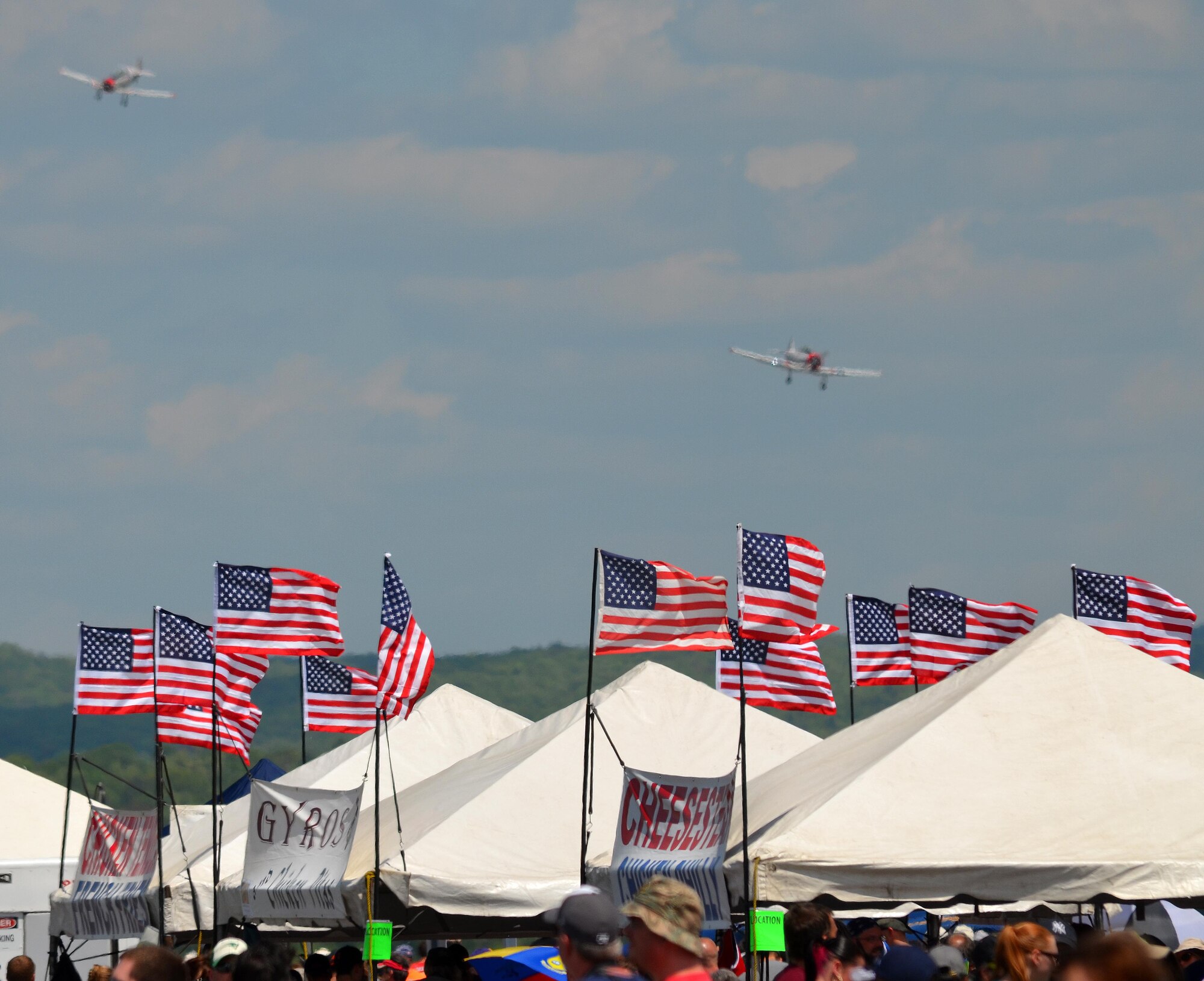 Nearly 400,000 spectators came to Westover Air Reserve Base to watch the 2015 Great New England Air Show, boasting more than two dozen current and vintage military aircraft. Aerial demonstration teams included the U.S. Navy Blue Angels, Canadian Snowbirds, U.S. Army’s Golden Knights parachuting team, F-22 demo team, Geico Skytypers, and Canadian CF-18 team. (U.S. Air Force photo/SSgt. Kelly Goonan)