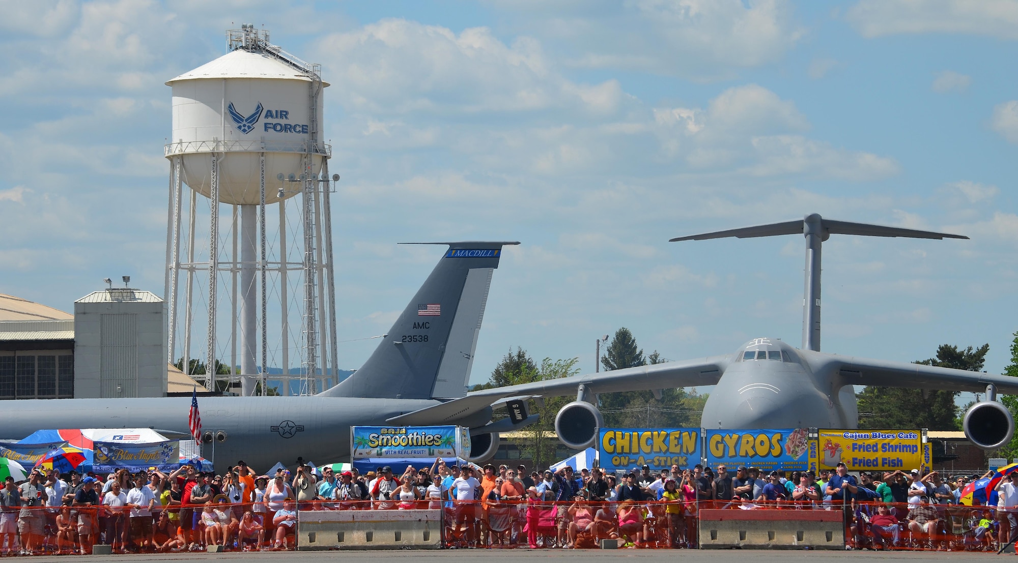 Nearly 400,000 spectators came to Westover Air Reserve Base to watch the 2015 Great New England Air Show, boasting more than two dozen current and vintage military aircraft. Aerial demonstration teams included the U.S. Navy Blue Angels, Canadian Snowbirds, U.S. Army’s Golden Knights parachuting team, F-22 demo team, Geico Skytypers, and Canadian CF-18 team. (U.S. Air Force photo/SSgt. Kelly Goonan)