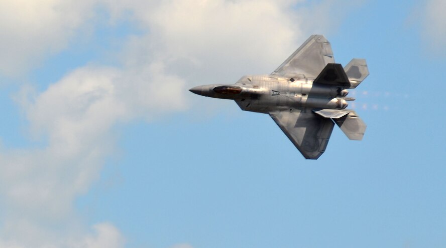 The F-22 Raptor demonstration team performed in front of nearly 400,000 spectators at The Great New England Air Show May 16-17. The air show kicked-off on Armed Forces Day, and each branch was showcased through performances by the U.S. Air Force F-22 Raptor, the U.S. Navy Blue Angels, and the U.S. Army Golden Knights. (U.S. Air Force photo by SrA. Monica Ricci)