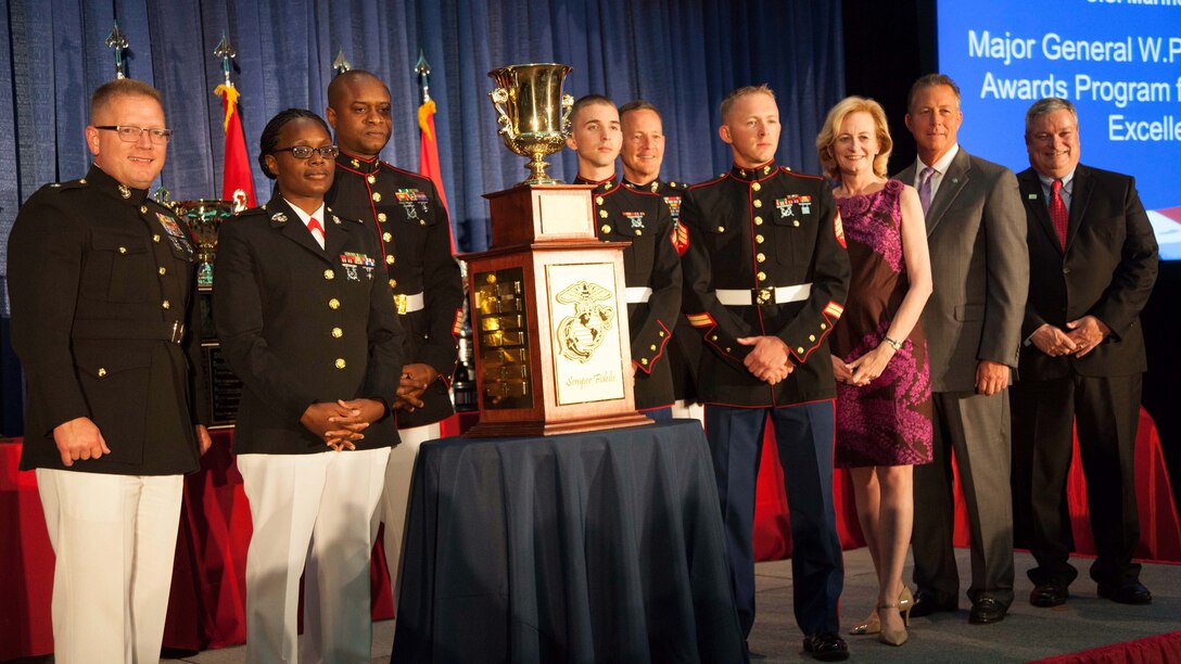Marines with Marine Wing Support Squadron 274 pose for a photo during the 2015 Armed Forces Food service Awards Dinner, May 15, at the Sheraton Chicago Hotel in Chicago. The National Restaurant Association hosted the event to honor service members from all branches of the military for their excellence in food services. The unit received an award for Best Active Field Mess at the ceremony.