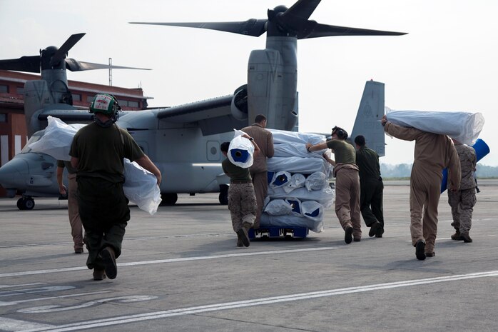 KATHMANDU, Nepal (May 16, 2015) - U.S. Service members from Joint Task Force 505 (JTF 505) load relief supplies from Samaritan's Purse International Relief Organization onto a U.S. Marine Corps MV-22 Osprey at Tribhuvan International Airport.  JTF 505 along with other multinational forces and humanitarian relief organizations are currently in Nepal providing aid after a 7.8 magnitude earthquake struck the country, April 25 and a 7.3 earthquake on May 12. At Nepal's request the U.S. government ordered JTF 505 to provide unique capabilities to assist Nepal.