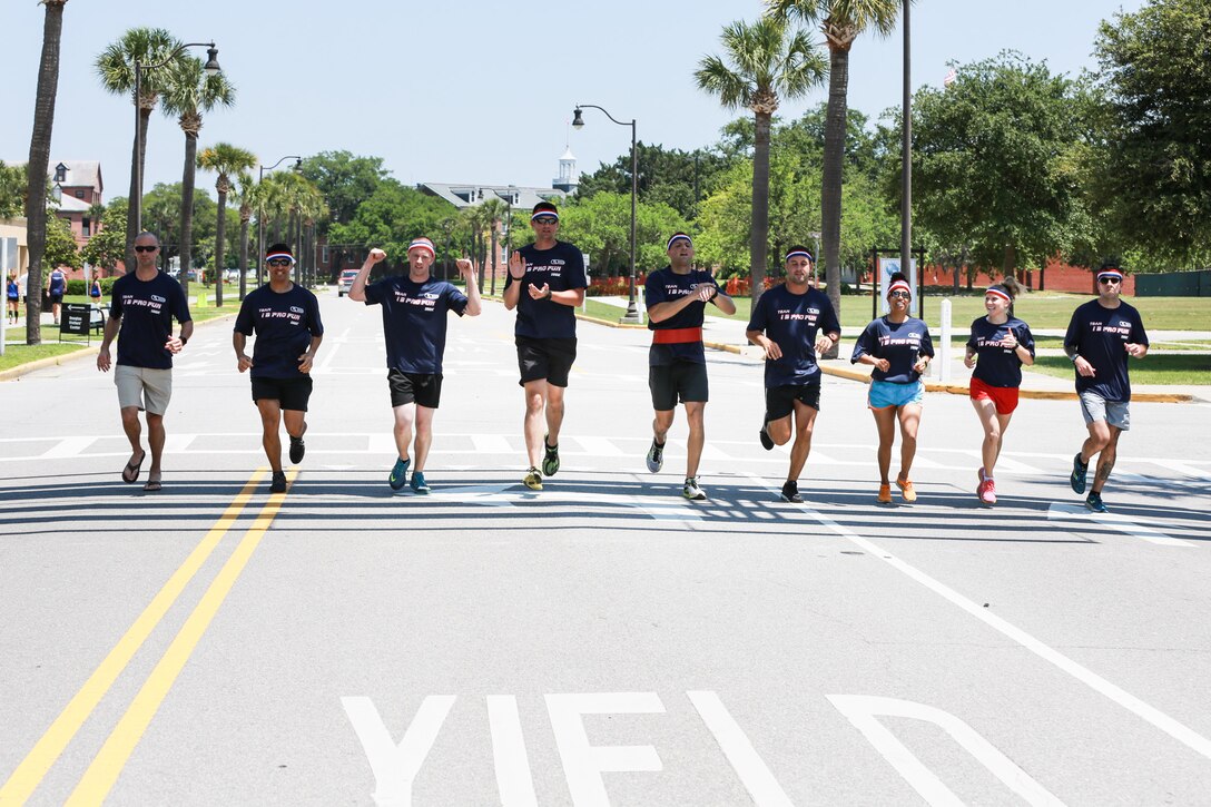 Team I B Profun participates in the Centennial 100k Relay Race aboard Marine Corps Recruit Depot Parris Island, S.C., May 16, 2015. Team I B Profun won the race with a time of seven hours and 26 minutes. (Photo by Lance Cpl. Allison Lotz)