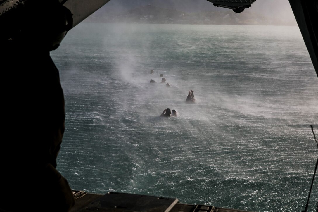 U.S. Marines with the 15th Marine Expeditionary Unit’s Maritime Raid Force helocast out of a CH-53 Super Stallion aboard Marine Corps Base Hawaii, May 14, 2015. The MRF is building on their success during the 15th MEU’s pre-deployment training program to ensure they are ready for a wide variety of missions. (U.S. Marine Corps photo by Cpl. Anna Albrecht/Released)
