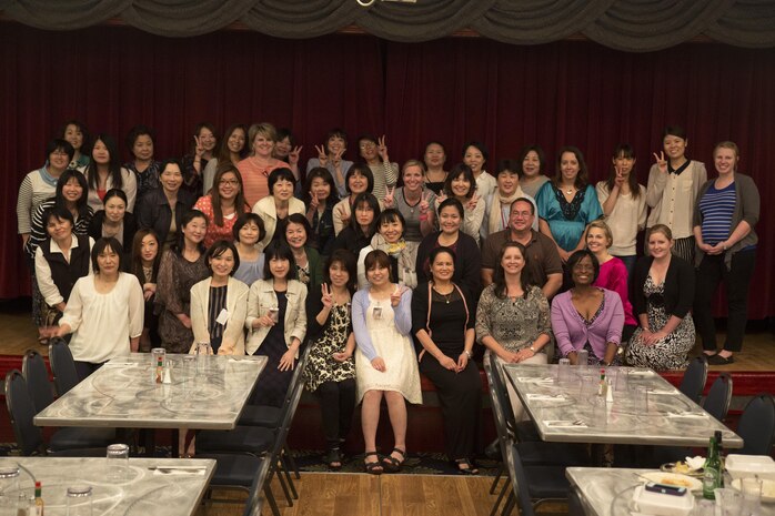 Nurses from Robert M. Casey Medical and Dental Clinic, Iwakuni Clinical Care, JA Hiroshima General Hospital and Medical Hospital Iwakuni Byoin pose for a picture during a Nurse’s Week dinner social at the Club Iwakuni Ballroom aboard MCAS Iwakuni, Japan, May 11, 2015. Branch Health Clinic celebrated Nurse’s Week for the first time, May 6-13, aboard station. Throughout the week, nurses from BHC came together for a series of events to celebrate a week that recognizes the importance and hard work that they do.