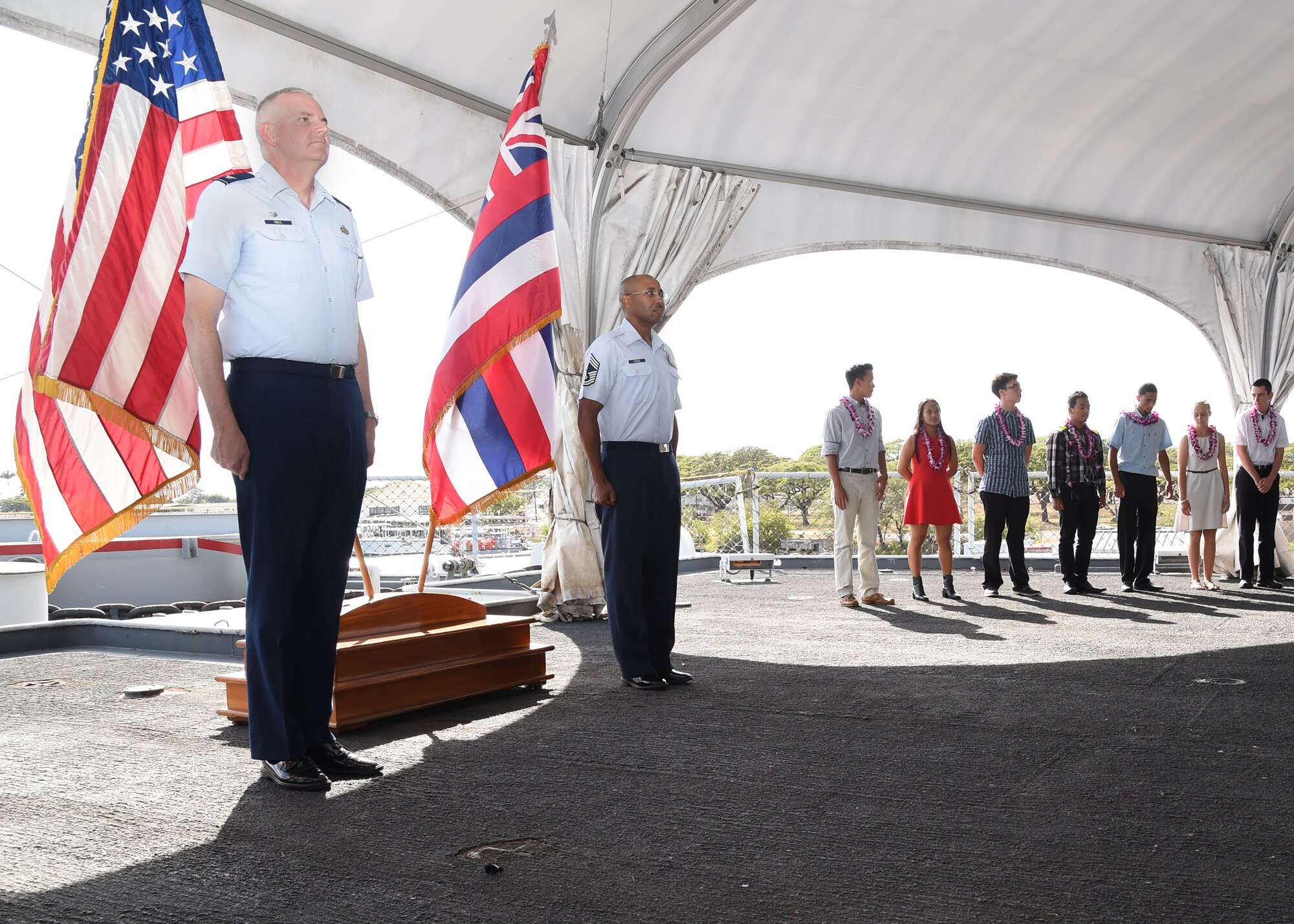 (left) Col. John J. Riehl, commander, 692nd Intelligence Surveillance and Reconnaissance Group and Chief Master Sgt. Russell Thomas, Chief of the Pacific Medical Enlisted Force, recognizes U.S Air Force Enlistees during the Our Community Salutes Recognition Ceremony at the USS Battleship Missouri Memorial on Ford Island, Hawaii, May 17, 2015. Our Community Salutes is a community-based initiative to recognize and honor graduating high school seniors who plan to join the Armed Forces after graduation. The OCS ceremony started in southern New Jersey in 2009 and has now spread across the nation. (U.S. Air Force photo by Tech. Sgt. Aaron Oelrich/Released) 