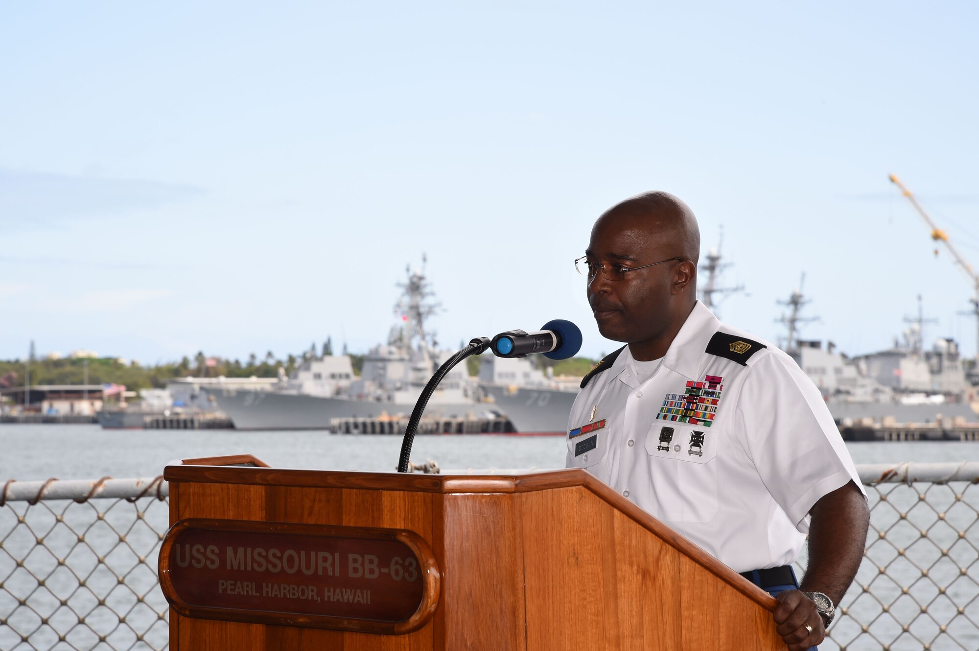 U.S. Army command Sgt. Maj. Finis A. Dodson, 94th Army Air Missile Defense Command, talks during the Our Community Salutes Recognition Ceremony at the USS Battleship Missouri Memorial on Ford Island, Hawaii, May 17, 2015. Our Community Salutes is a community-based initiative to recognize and honor graduating high school seniors who plan to join the Armed Forces after graduation. The OCS ceremony started in southern New Jersey in 2009 and has now spread across the nation. (U.S. Air Force photo by Tech. Sgt. Aaron Oelrich/Released) 