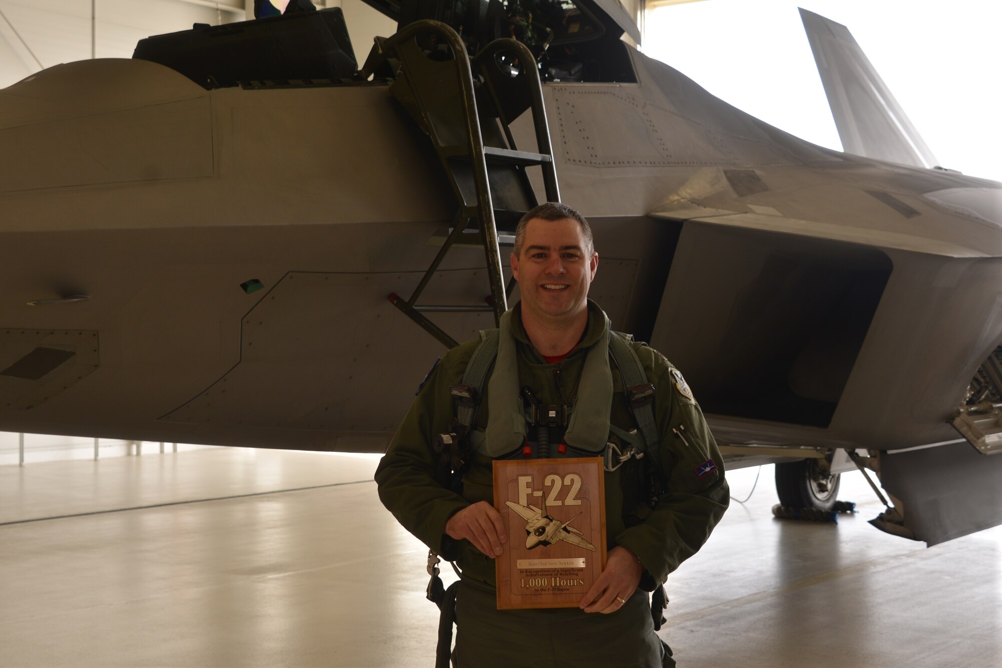 Maj. Chad Newkirk, a Reserve F-22 pilot assigned to the 477th Fighter Group, is the eleventh pilot in Air Force history and fourth pilot in the 477th FG to reach 1,000 flight hours in the F-22 during a sortie here in April. (U.S. Air Force photo/Tech. Sgt. Dana Rosso)