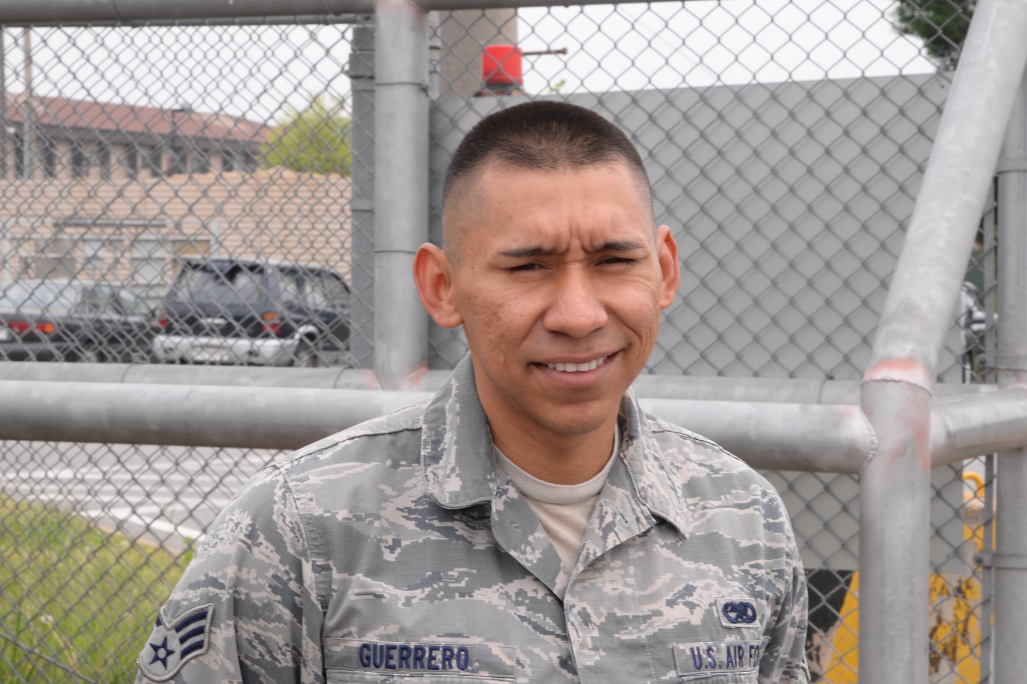 Senior Airman Angel Guerrero, 36th Aircraft Maintenance Unit aircraft cannibalization manager, poses for a photo May 1, 2015, at Osan Air Base Republic of Korea. Guerrero was chosen as a Team Osan Spotlight award winner. Individuals who are chosen for this spotlight recognition are distinguished as consistent, superior performers within their squadrons. (U.S. Air Force photo by Staff Sgt. Benjamin Sutton/Released)