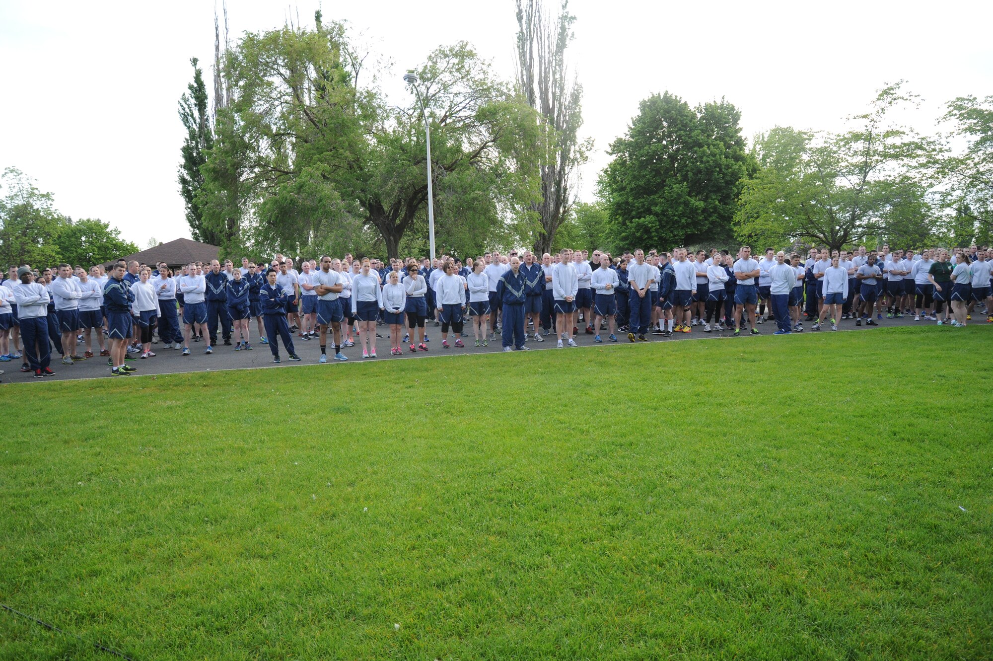 Airmen from Team Fairchild gather for the peace officer memorial 5k run May 15, 2015, at Fairchild Air Force Base, Wash. Wing runs encourage morale and camaraderie among service members. (U.S. Air Force photo/Airman 1st Class Nicolo J. Daniello)