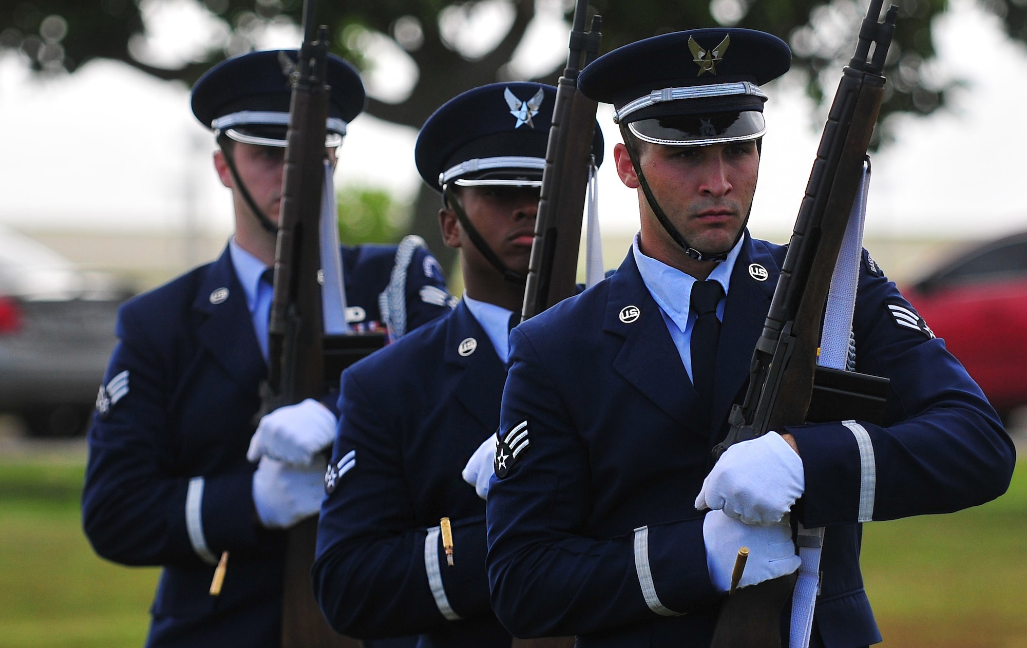 Andersen Air Force Base Honorguardsmen charge their ceremonial rifles during the firing party sequence of a Police Week retreat ceremony, May 13, 2015, at Andersen AFB, Guam. The ceremony recognized law enforcement professionals in honor of National Police Week. Multiple events served to showcase Andersen AFB security forces and the sacrifices police forces make to protect the community. (U.S. Air Force photo by Senior Airman Alexander W. Riedel/Released)