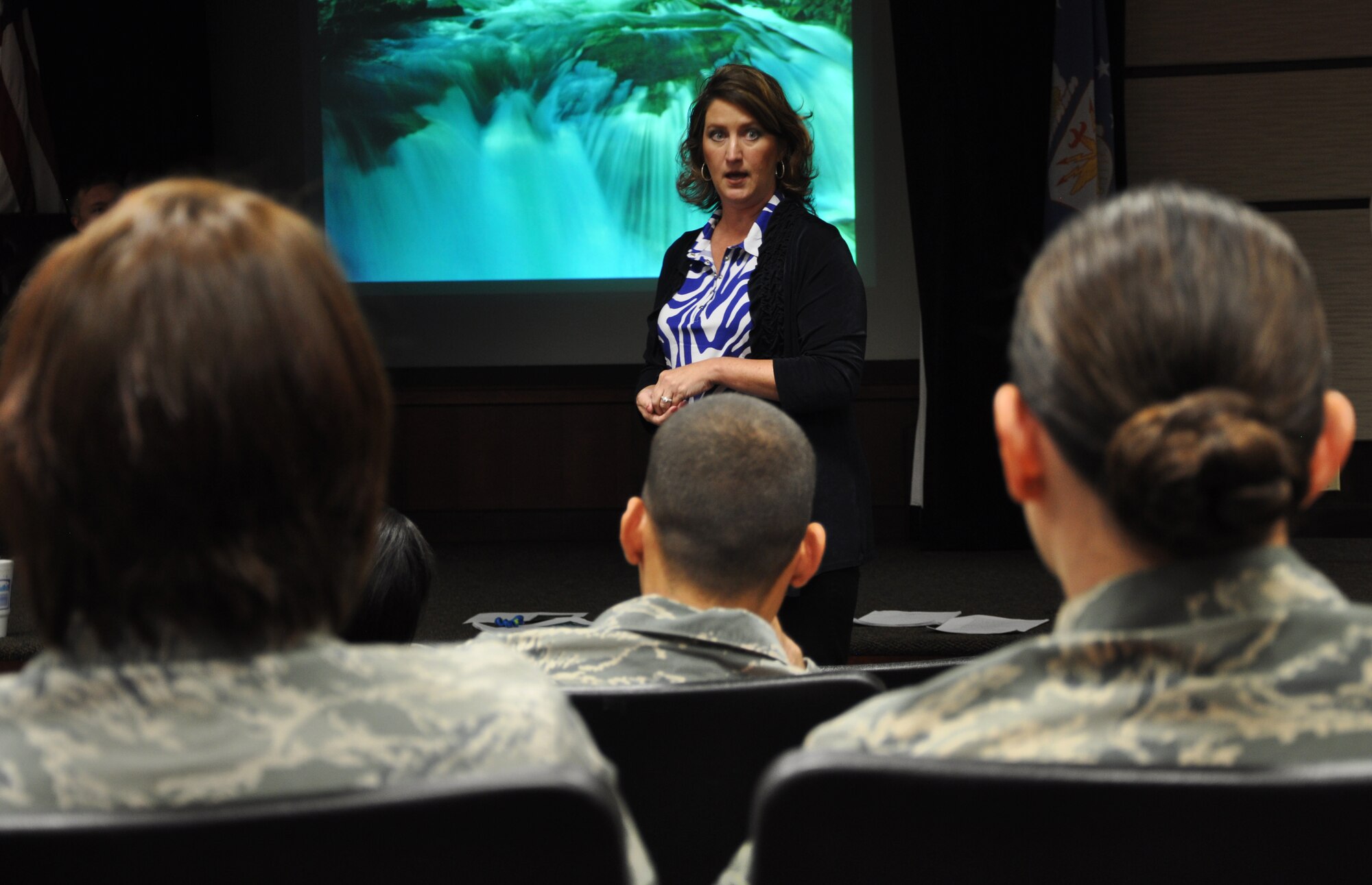 Lynn Emond, 22nd Air Refueling Group sexual assault response coordinator, speaks with members of the 931st Air Refueling Group during a "Respect the Red Line" small group discussion, May 20, 2015 at McConnell Air Force Base, Kan. The training is meant to foster Airmen's understanding of how supporting a climate of respect will reduce sexual assault. (U.S. Air Force photo by Tech. Sgt. Abigail Klein)
