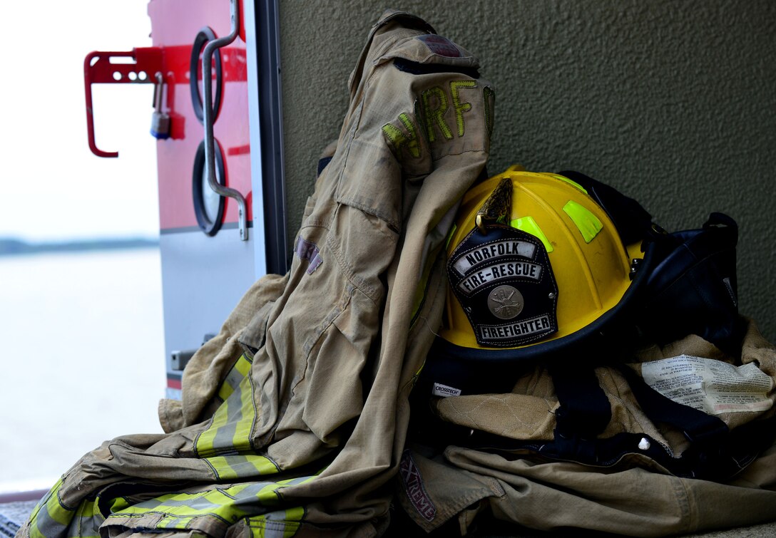Approximately 150 U.S. and foreign military and U.S. civilian firefighters participated in the 24th Annual Hampton Roads Marine Firefighting School maritime incident response exercise at Fort Eustis, Va., May 15, 2015. During the exercise, the firefighters worked together to put out a simulated shipboard fire. (U.S. Air Force photo by Staff Sgt. Natasha Stannard/Released)