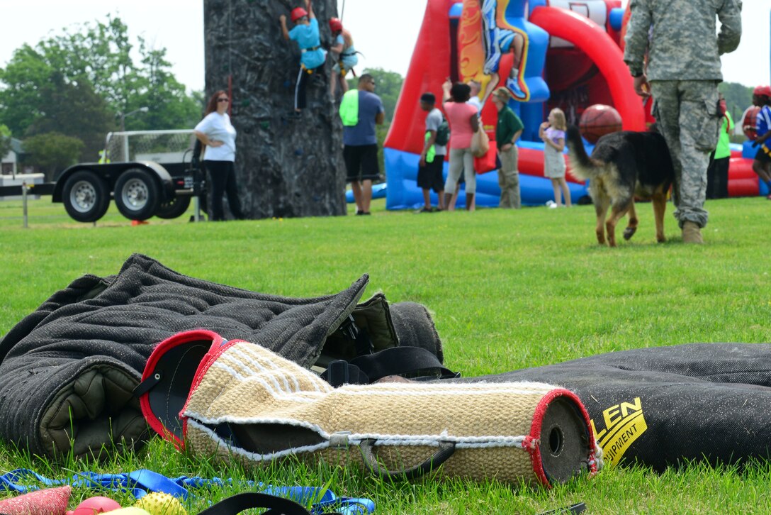 A military working dog demonstration took place during the 50th Vietnam War Commemoration events at Fort Eustis, Va., May 16, 2015. Patrons watched different demonstrations showing the different skills the MWDs have.  (U.S. Air Force photo by Senior Airman Kimberly Nagle/Released)  