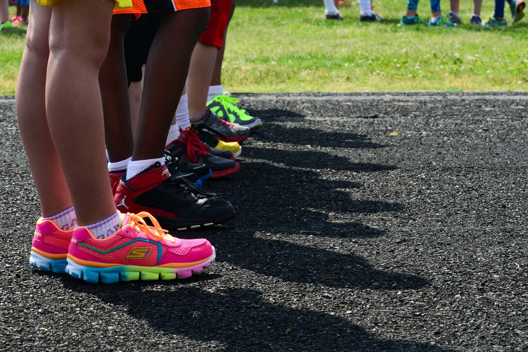 Children line up to take part in a kids run event during the 50th Vietnam War Commemoration at Fort Eustis, Va., May 16, 2015. The kid’s run was one of many events that took place during the commemoration weekend. (U.S. Air Force photo by Senior Airman Kimberly Nagle/Released)  