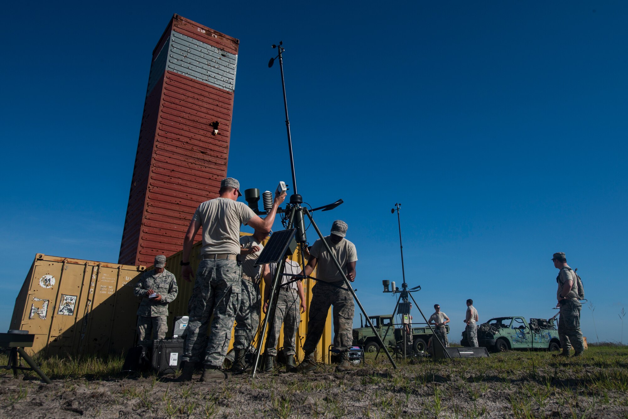 Airmen from the 3d Weather Squadron set up a tactical meteorological observing system during Spartan Warrior May 13, 2015, at Avon Park Air Force Range, Fla. The TMOS is used in the field to measure wind speeds, cloud levels and temperature. (U.S. Air Force photo by Senior Airman Ryan Callaghan/Released)	
