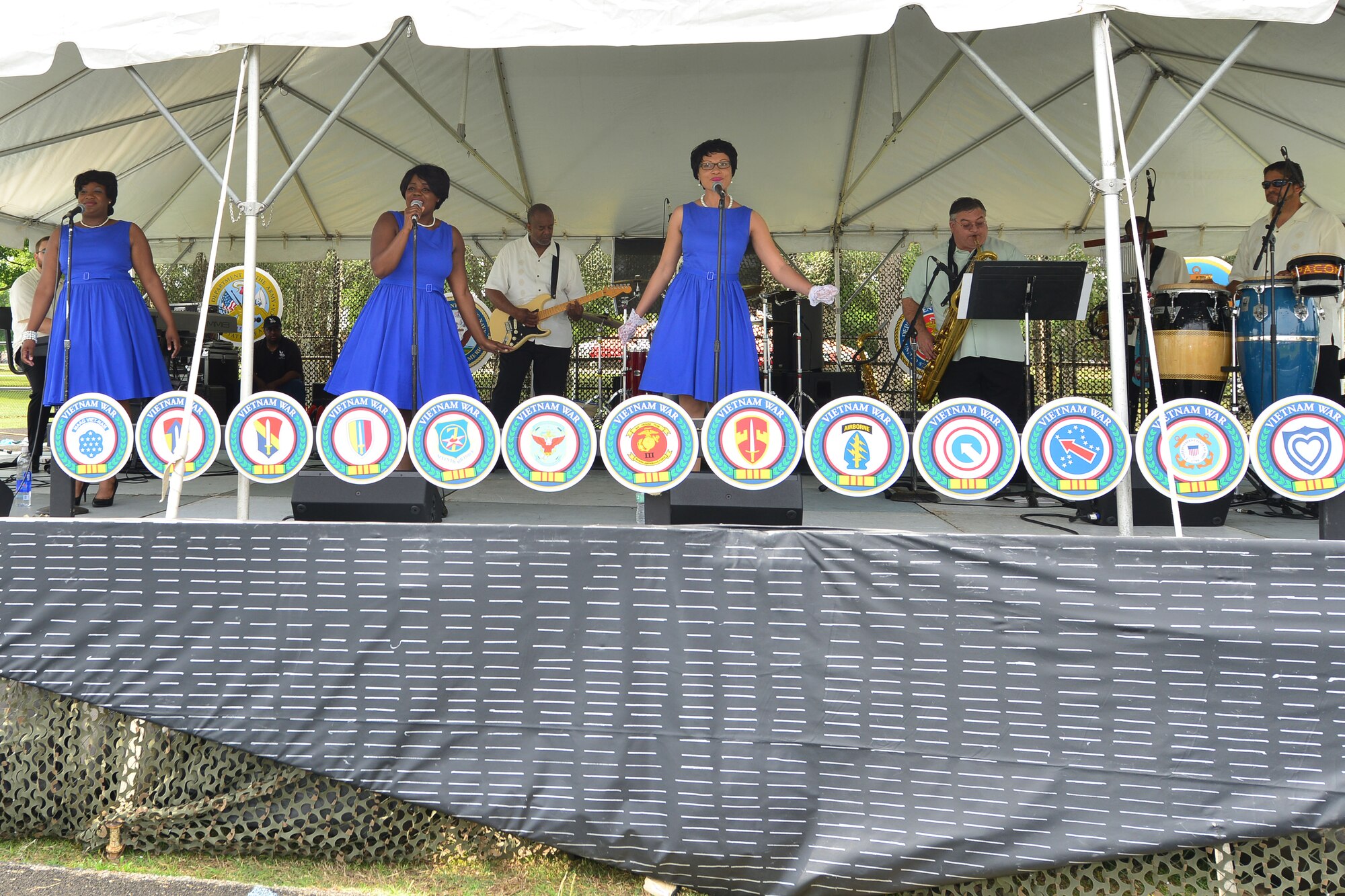 A band performs at the Joint Base Langley-Eustis Vietnam Commemoration participants at Fort Eustis, Va., May 16, 2015. The Commemoration honored those who served in the Vietnam Conflict, and included performances, static and historical displays, demonstrations, children’s events and guest speakers. (U.S. Air Force photo by Staff Sgt. Natasha Stannard/Released)