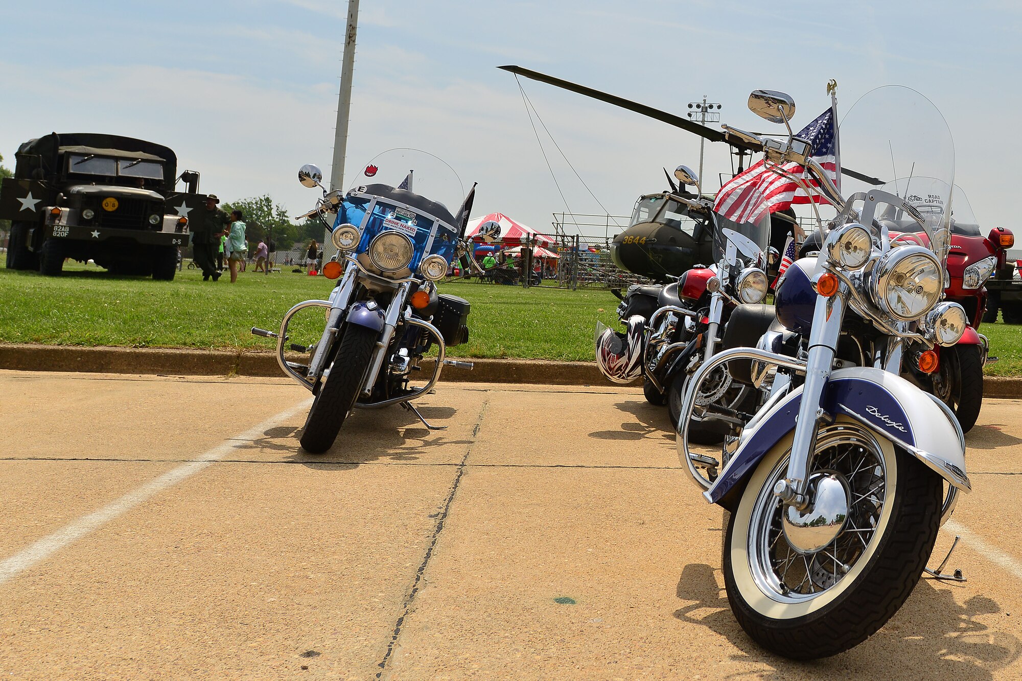 Vietnam Veterans with the American Legion Post 368 Newport News display their motorcycles at the Joint Base Langley-Eustis Vietnam Commemoration at Fort Eustis, Va., May 16, 2015. The Commemoration was an opportunity to honor those who served in the Vietnam conflict. The commemoration is set to take place annually for the next 15 years, and it will alternate locations between Fort Eustis and Langley Air Force Base yearly. (U.S. Air Force photo by Staff Sgt. Natasha Stannard/Released)