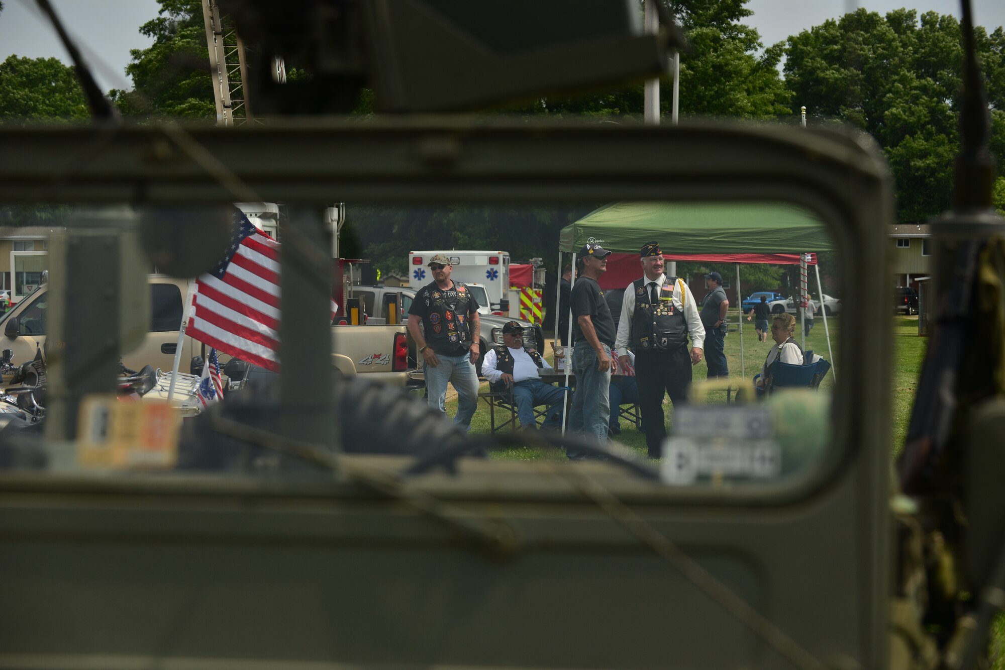 Vietnam Veterans with the American Legion Post 368 Newport News meet up at the Joint Base Langley-Eustis Vietnam Commemoration at Fort Eustis, Va., May 16, 2015. The legion members rode their motorcycles to the event and displayed them along with classic cars. (U.S. Air Force photo by Staff Sgt. Natasha Stannard/Released)