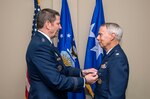 Gen. Robin Rand, commander of Air Education and Training Command, presents the Prisoner of War Medal to retired Air Force Lt. Col. Timothy Skvarenina during a ceremony honoring his late father, 1st Lt. Stephen Skvarenina, May 12 at The Resort at Hill Country Retreat in San Antonio. Skvarenina's father was awarded the POW Medal posthumously for his actions while being held captive in Switzerland prison camps from March 18, 1944 to
Feb. 17, 1945. (U.S. Air Force photo by Johnny Saldivar/released)