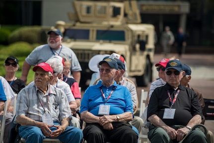 Veterans of the Anzio Beachhead Invasion of 1944, attend a police week retreat ceremony, May 15, 2015, at Joint Base Charleston, S.C. during a tour of the installation. The veterans were in Charleston to celebrate what could be their last reunion event together and to share their stories with the servicemembers stationed here. The invasion of Anzio, near the outskirts of Rome, began Jan. 22, 1944, lasted four months and took the lives of nearly 2,800 Americans . (U.S. Air Force photo/Senior Airman Jared Trimarchi)
