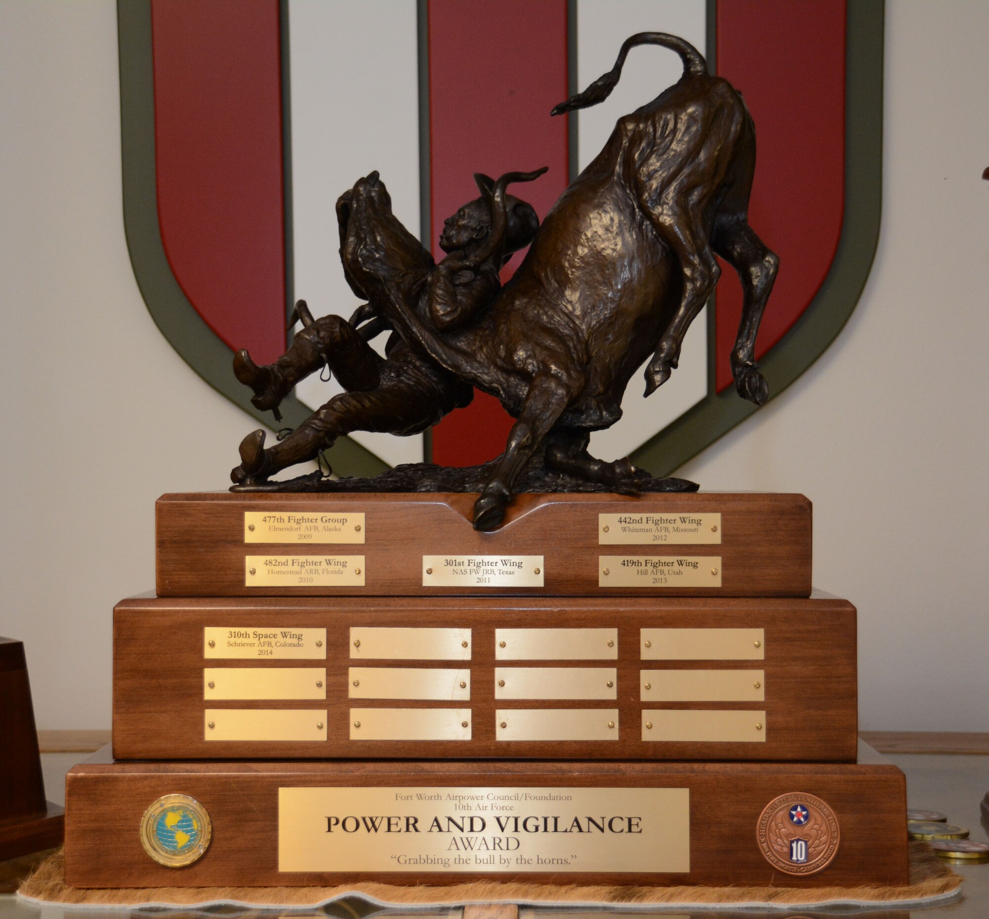 The 310th Space Wing won the 10th Air Force Power and Vigilance award May 12, 2015.  The award is presented annually to the Tenth Air Force unit that exhibits the NAF mission as “the premier provider of affordable, integrated, flexible, and mission-ready Citizen Airmen to execute power and vigilance missions in support of U.S. National security.” The 310th SW is the sixth unit to be honored since the award’s establishment in 2009.  (U.S. Air Force photo/Staff Sgt. Samantha Mathison)