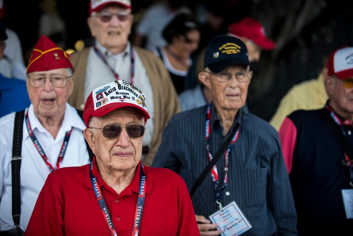 Veterans from the 1944 Anzio Beachhead Invasion stand inside the belly of a C-17 Globemaster III, May 15, 2015 at Joint Base Charleston, S.C. during a tour of the installation. The veterans were in Charleston to celebrate what could be their last reunion event together and to share their stories with the servicemembers stationed here. The invasion of Anzio, near the outskirts of Rome, began Jan. 22, 1944, lasted four months and took the lives of nearly 2,800 Americans . (U.S. Air Force photo/Senior Airman Jared Trimarchi) 