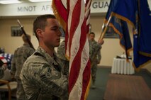 Airman 1st Class Jacob Alexander, 5th Security Forces Squadron response force member, stands at attention while practicing a routine in Honor Guard training at Minot Air Force Base, May 14 N.D., 2015. Discipline and patience are some of the attributes Airmen need to perform in the Honor Guard. (U.S. Air Force photo/Airman 1st Class Christian Sullivan)