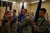 Airmen stand at attention while practicing Honor Guard routines at Minot Air Force Base, N.D., May, 14, 2015. Performing in the Honor Guard is an opportunity for Airmen to learn about Air Force heritage and tradition. (U.S. Air Force photo/Airman 1st Class Christian Sullivan