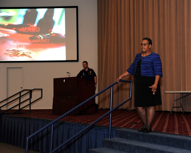 Vanessa Braggs, Mothers Against Drunk Driving northern Louisiana chapter president, speaks to Airmen during a Wing Safety Day briefing on Barksdale Air Force Base, Louisiana, May 15, 2015. Braggs shared her tragic story of how her husband and two young children lost their lives when her family's vehicle was struck by a drunk driver. She shares her story with audiences multiple times each month so that people will think twice before getting behind the wheel after drinking. (U.S. Air Force photo/Senior Airman Joseph A. Pagán Jr.)
