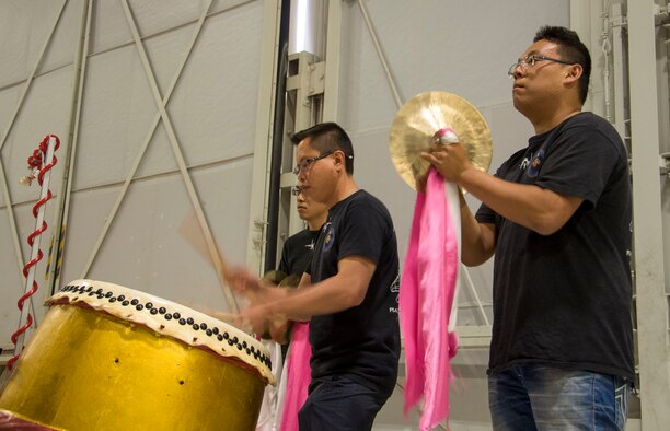 Members of the Singaporean Air Force play traditional instruments as part of the Peace Carvin V opening ceremony at Mountain Home Air Force Base, Idaho, May 15, 2015. The ceremony opened with music accompanying a traditional Singaporean dragon dance.  (U.S. Air Force photo by 2nd LT. Kippun D. Sumner/Released)(U.S. Air Force photo by 2nd LT. Kippun D. Sumner/RELEASED)

