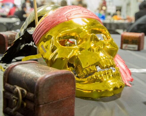 A skull mask lays on display as part of a table decoration for the Peace Carvin V Celebration at Mountain Home Air Force Base, Idaho, May 15, 2015. The ceremony is held every year in celebration of growing bond between the United States Air Force and the Singaporean Air Force. (U.S. Air Force photo by 2nd LT. Kippun D. Sumner/RELEASED)