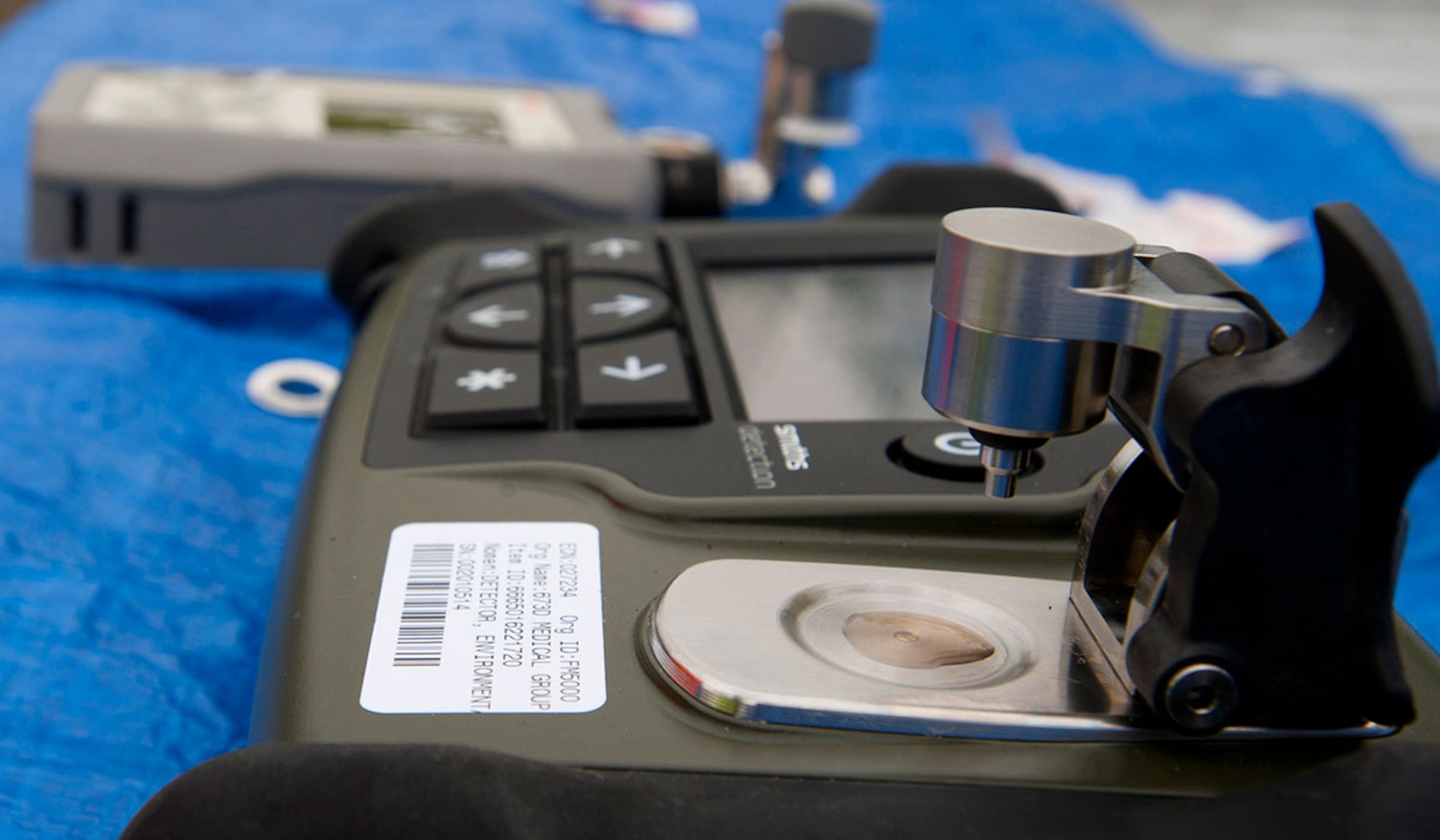 Hand-held chemical identifiers analyze chemical samples during Integrated Base Emergency Response Training on Joint Base Elmendorf-Richardson, Alaska, May 14, 2015. The devices have a self-contained anvil head for easy sampling of solid and liquid chemicals in the field. The results help determine what kind of protection is needed to keep emergency responders safe as they neutralize the area. (U.S. Air Force photo/Tech. Sgt. Robert Barnett)