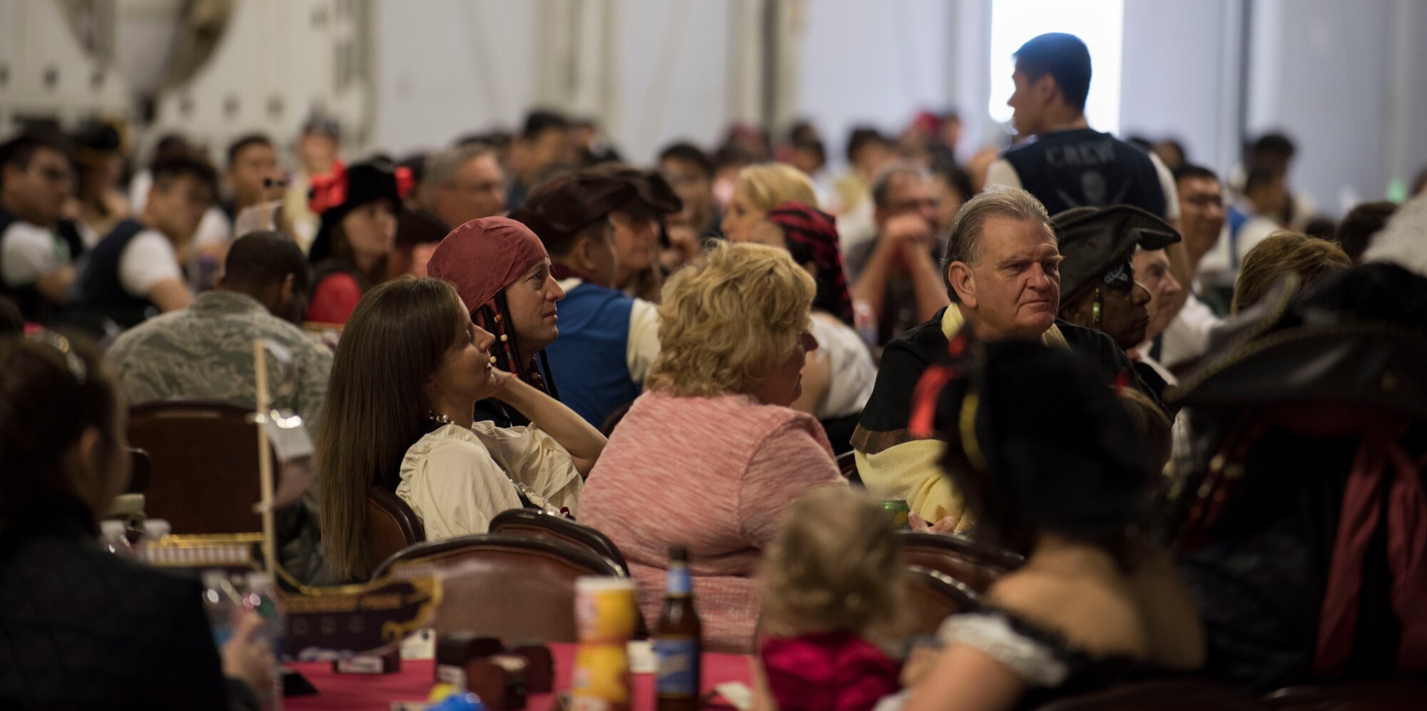 Members of Mountain Home Air Force Base watch as members of the 428th Fighter Squadron perform a cultural dance at MHAFB, Idaho, May 15, 2015. The 428th FS hosted a variety of events that were open to military members and their families.(U.S. Air Force photo by Airman 1st Class Jeremy L. Mosier/Released)