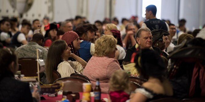 Members of Mountain Home Air Force Base watch as members of the 428th Fighter Squadron perform a cultural dance at MHAFB, Idaho, May 15, 2015. The 428th hosted a variety of events that were open to military members and their families.(U.S. Air Force photo by Airman 1st Class Jeremy L. Mosier/Released)