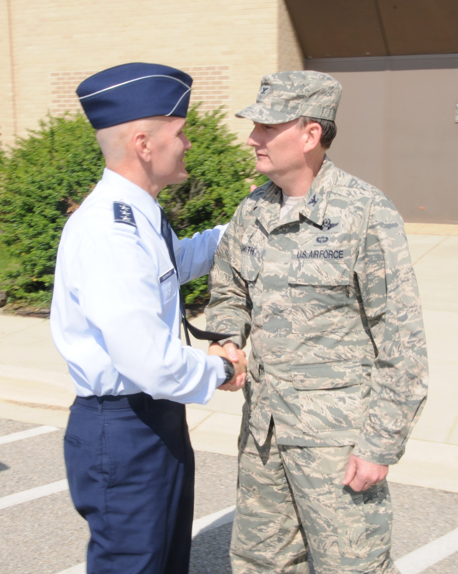 Lt. Gen. Carlton D. Everhart II, 18th Air Force commander, is greeted by Col. Thomas K. Smith, Jr., 459th Air Refueling Wing commander, during Everhart's visit to 459 ARW on May 13, 2015. Lt. Gen. Everhart visited the unit as part of his base-wide visit at Joint Base Andrews, Md. (Air Force Photo / Maj. Tim Smith)