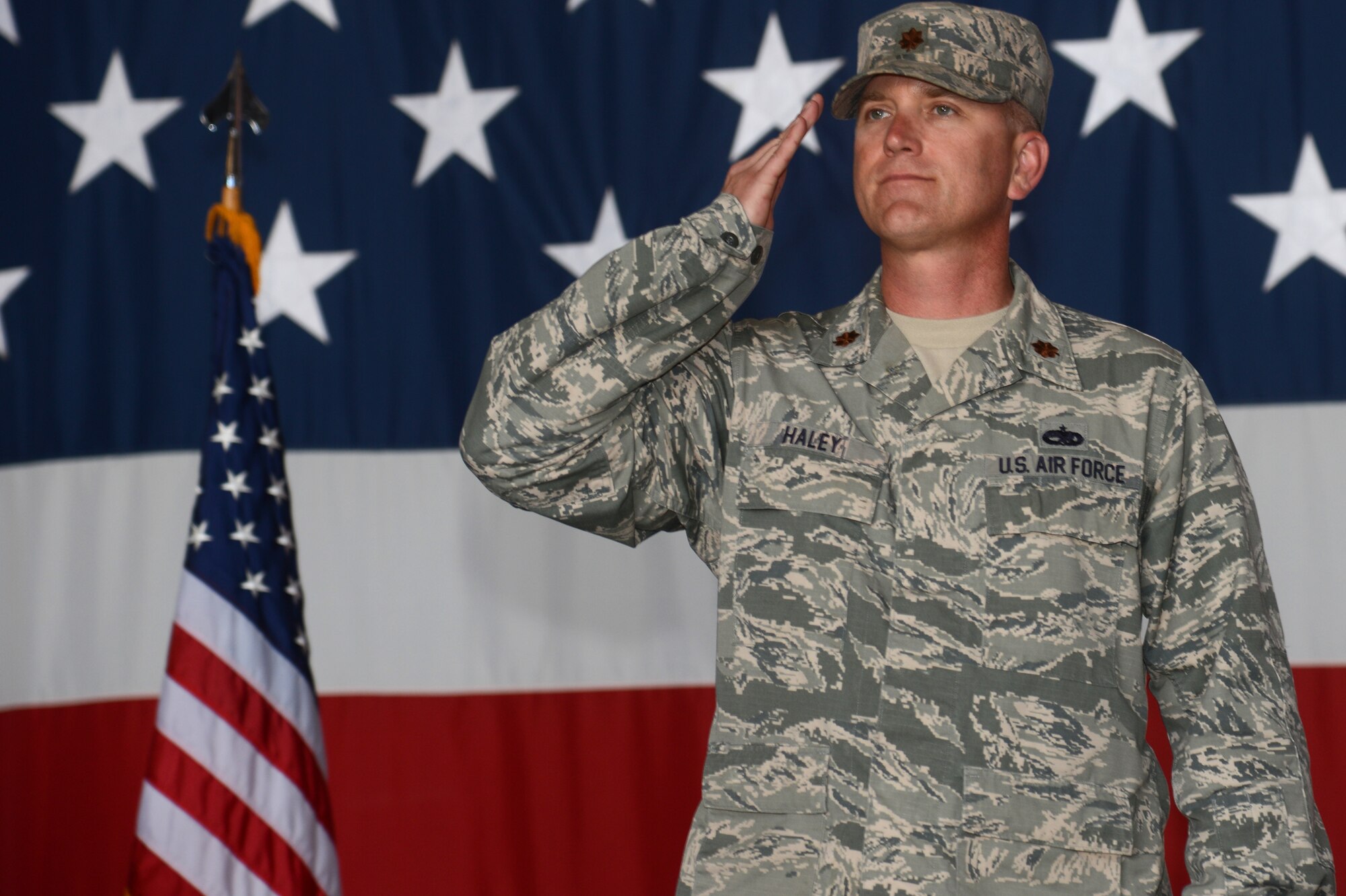 U.S. Air Force Maj. Christopher Haley, 20th Component Maintenance Squadron commander, renders his first salute to the Airmen of the 20th CMS during a change of command ceremony at Shaw Air Force Base, S.C., May 18, 2015. Haley assumed command from Maj. Jason Kneuer during a traditional change of command ceremony. (U.S. Air Force photo by Senior Airman Jonathan Bass/Released)