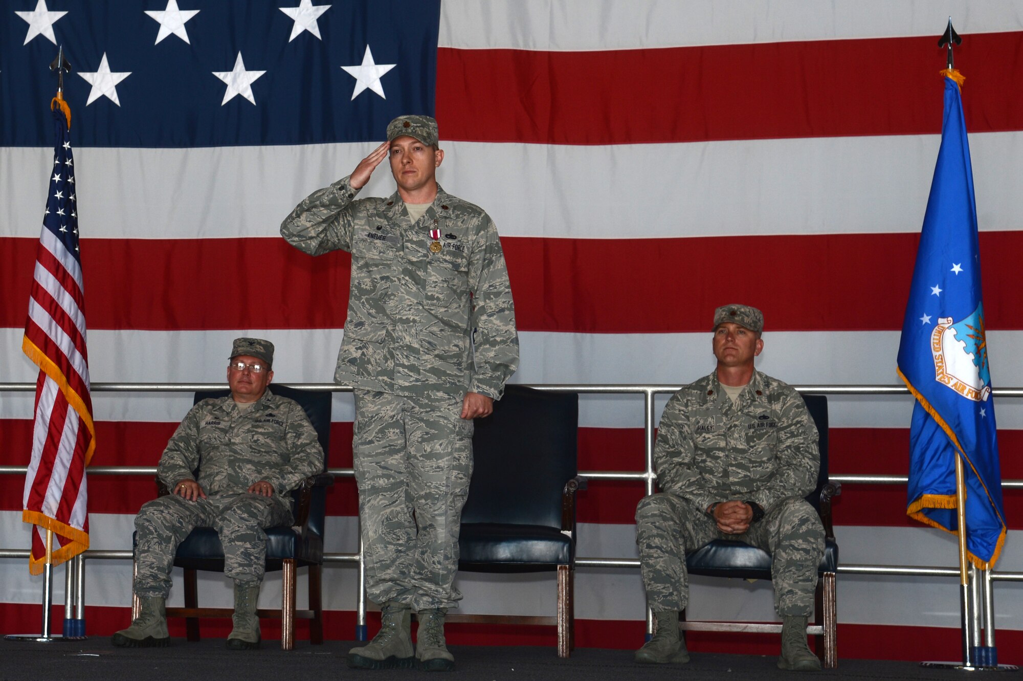 U.S. Air Force Maj. Jason Kneuer, 20th Component Maintenance Squadron commander, renders his final salute to members of the squadron during a change of command ceremony at Shaw Air Force Base, S.C., May 18, 2015. Kneuer relinquished command to Maj. Christopher Haley, in a traditional change of command ceremony. (U.S. Air Force photo by Senior Airman Jonathan Bass/Released)