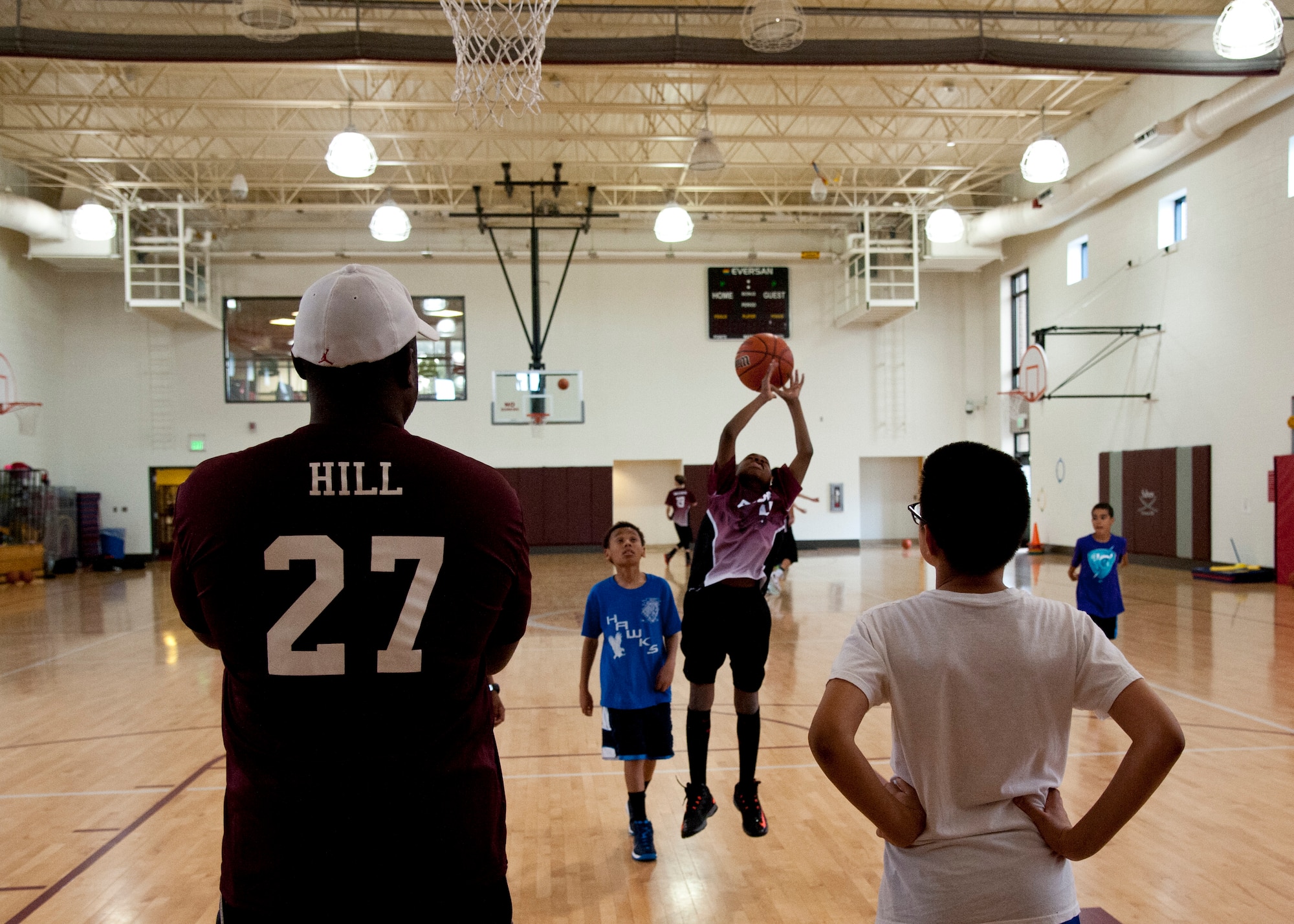 PETERSON AIR FORCE BASE, Colo. – Members of the competitive youth basketball program practice for the end of spring league tournament at the RP Youth Center May 14, 2015. Peterson AFB and Fort Carson put together a combined basketball program as part of the Southern Colorado Basketball League. Players who do not make the competitive team can join the developmental team. Tryouts for the summer league will be held at the Peterson Youth Center at the following date and times:
3rd grade – 7th grade boys tryout May 30 from 8-9:30 a.m.
8th grade – 10th grade boys tryout May 30 from 9:30-11 a.m.
6th grade – 8th grade girls tryout May 30 from 11 a.m.-12:30 p.m.
Contact Peterson Youth Sports director carlos.wade.4@us.af.mil for more information. (U.S. Air Force photo by Senior Airman Tiffany DeNault)