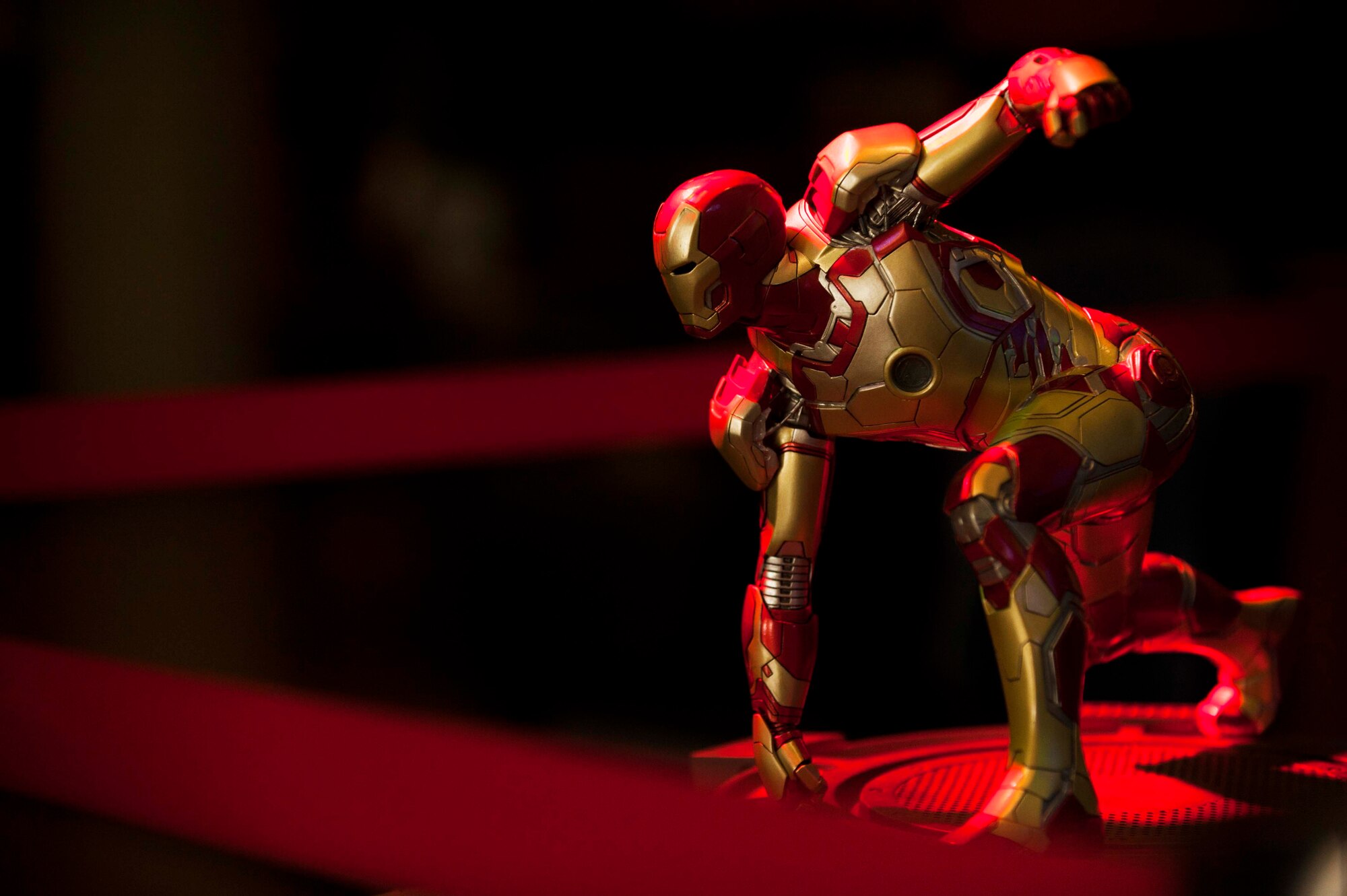 A figurine of a comic book character is on display during the 2015 Comic Con at Club Eifel on Spangdahlem Air Base, Germany, May 16, 2015. The convention displayed figures and statues at the front entrance of the convention to decorate and set the atmosphere for the convention. (U.S. Air Force photo by Airman 1st Class Timothy Kim/Released)