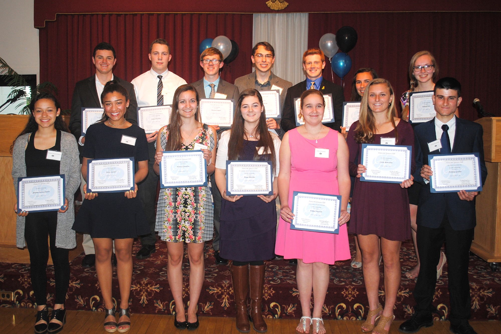 Students pose for a group photo following the 54th annual Hanscom Spouses Club Scholarship Awards Night at the Minuteman Commons May 13. HSC awarded $37,500 to 17 high school graduates and two spouses at the event. (Courtesy photo)
