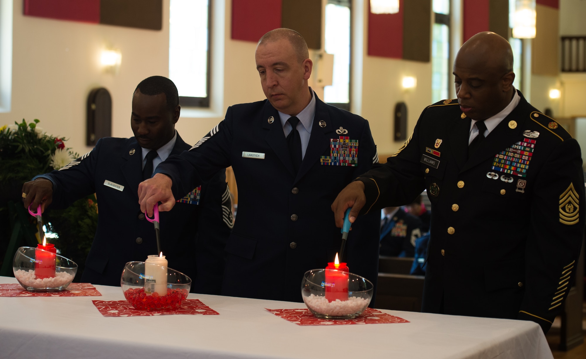 U.S. Air Force Capt. Cyriacus Onyejegbu, 86th Airlift Wing chaplain, speaks with the audience during the Kindergraves memorial service May 16, 2015, in Kaiserslautern, Germany. Children buried here were no more than 12 months old during 1952 to 1971, most died of various childhood diseases or birth complications. Representatives from Ramstein Air Base, Germany, and the host nation serve as co-chairs for the Kaiserslautern Kindergraves Memorial Foundation which maintains open communication with families, preserves historical archives, conducts ceremonies and provides oversight to site maintenance. (U.S. Air Force photo/Senior Airman Jonathan Stefanko)